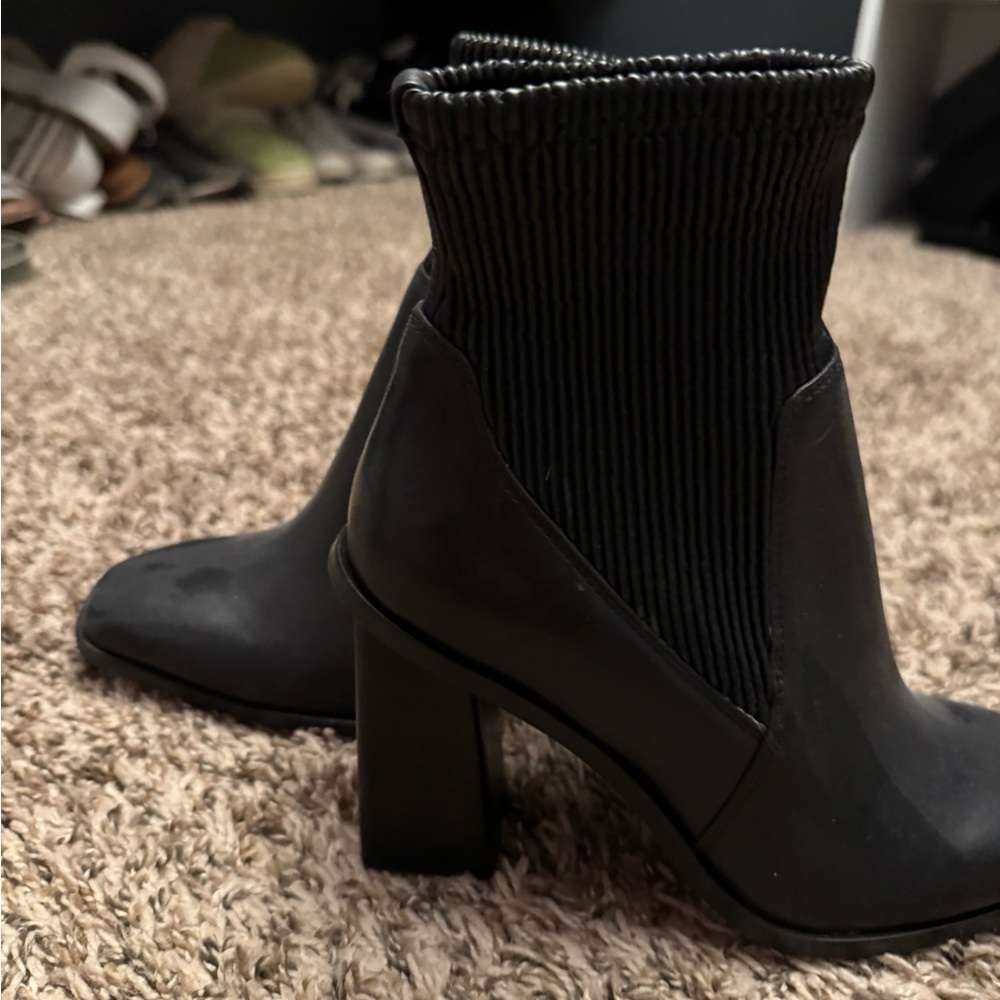 Black boot by Vince Caputo